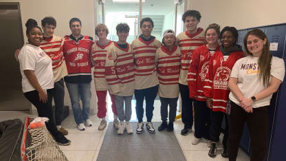 Raven Payne with a hockey team